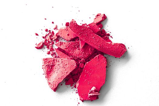 Pink eye shadow powder as makeup palette closeup isolated on white background, crushed cosmetics and beauty textures