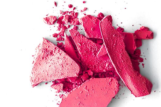 Pink eye shadow powder as makeup palette closeup isolated on white background, crushed cosmetics and beauty textures