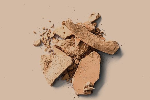 Beige eye shadow powder as makeup palette closeup, crushed cosmetics and beauty textures