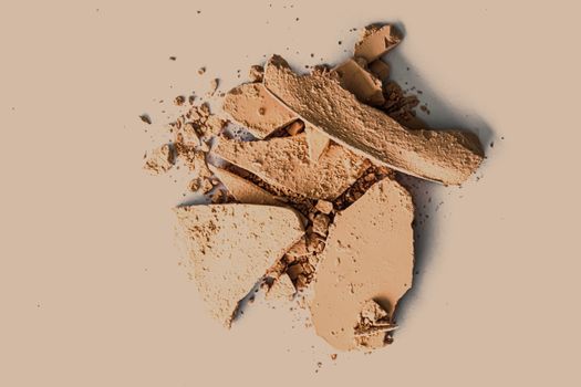 Beige eye shadow powder as makeup palette closeup, crushed cosmetics and beauty textures