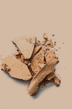 Beige eye shadow powder as makeup palette closeup, crushed cosmetics and beauty textures