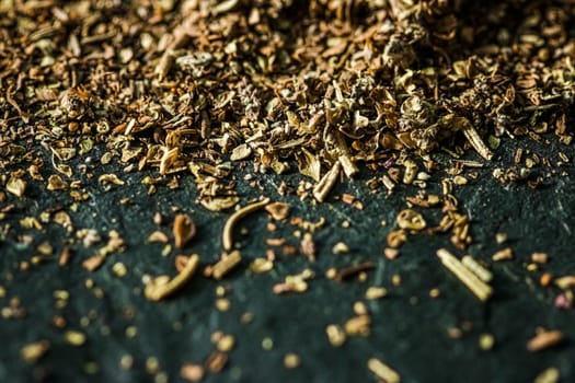 Provencal spices mix closeup on luxury stone background as flat lay, dry food spices and recipe ingredients