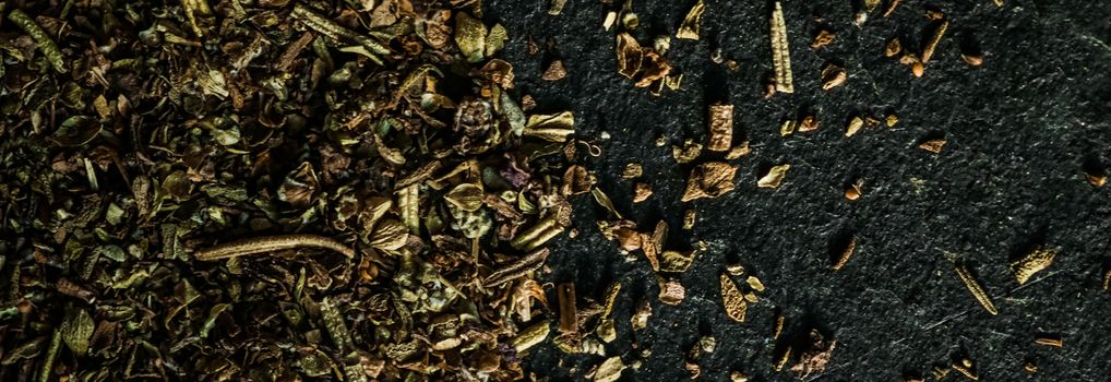 Provencal spices mix closeup on luxury stone background as flat lay, dry food spices and recipe ingredients