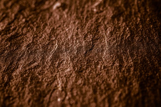 Brown stone texture as abstract background, design material and textured surfaces