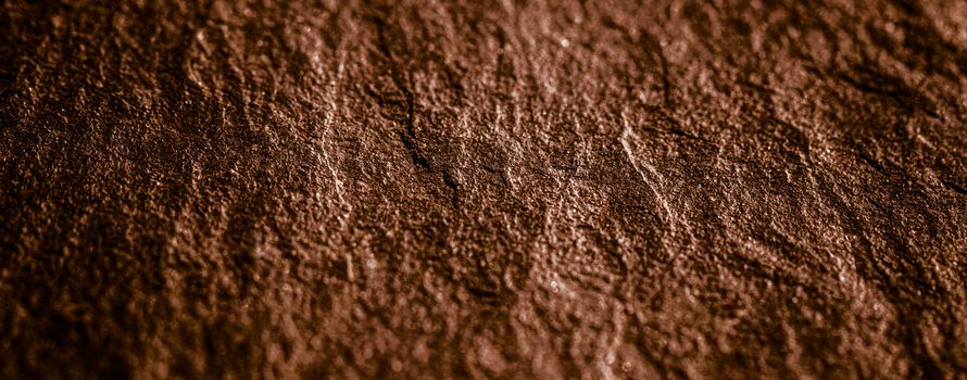 Brown stone texture as abstract background, design material and textured surfaces