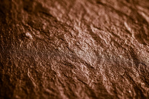 Brown stone texture as abstract background, design material and textured surfaces