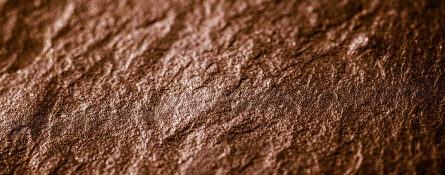 Brown stone texture as abstract background, design material and textured surfaces