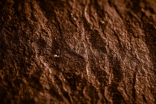 Brown stone texture as abstract background, design material and textured surfaces