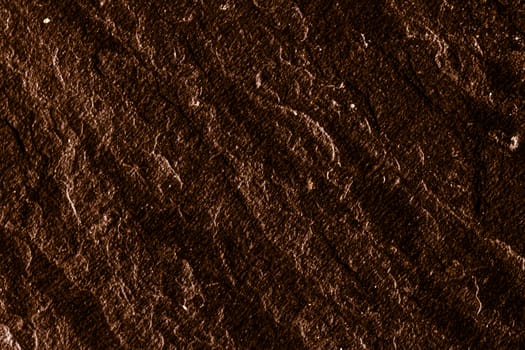 Brown stone texture as abstract background, design material and textured surfaces