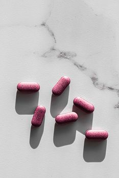 Pink pills as herbal medication, pharma brand store, probiotic drugs as nutrition healthcare or diet supplement products for pharmaceutical industry ads