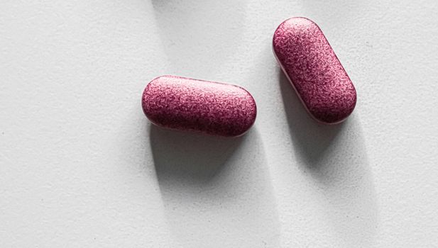 Pink pills as herbal medication, pharma brand store, probiotic drugs as nutrition healthcare or diet supplement products for pharmaceutical industry ads