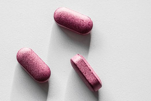 Pink pills as herbal medication, pharma brand store, probiotic drugs as nutrition healthcare or diet supplement products for pharmaceutical industry ads