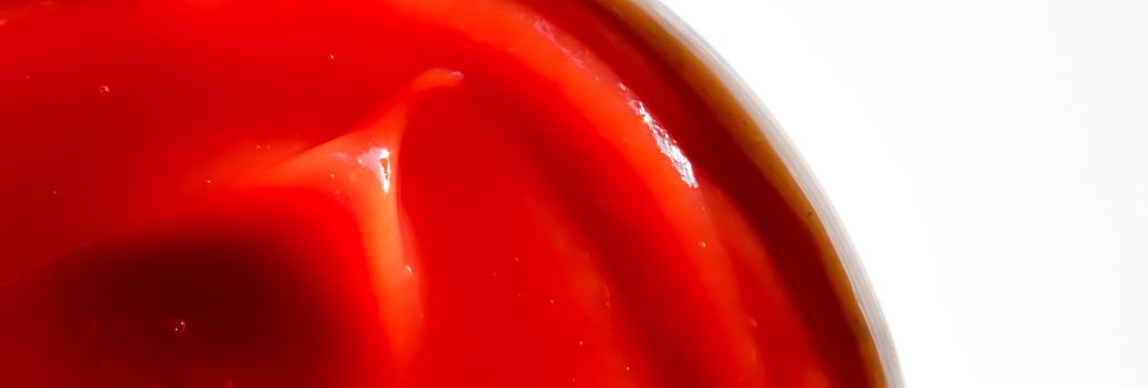 Organic ketchup, tomato sauce closeup, food background and homemade recipes