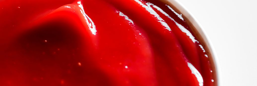 Organic ketchup, tomato sauce closeup, food background and homemade recipes