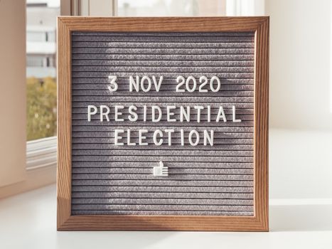 Announcement of USA Presidential Election at 3rd November 2020. Call to go to the vote. Letter board on white window sill.