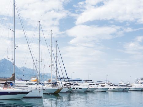 Yachts are moored at the Grand Marina, Kemer, Turkey. Beautiful ships for tourist trips on the Mediterranean sea.