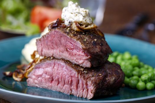grilled steak with roasted onions