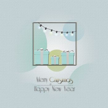 Blue Christmas gift boxes, string of lights in gold frame on pastel background, Text Merry Christmas Happy New Year 3D illustration