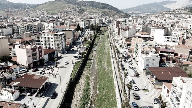 good looking wide aerial shoot from a little village with cool colors - there is a creek over there. photo has taken at aydin/turkey.