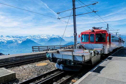 Famous electric red tourist swiss train on Rigi mountain,Switzerland,Europe