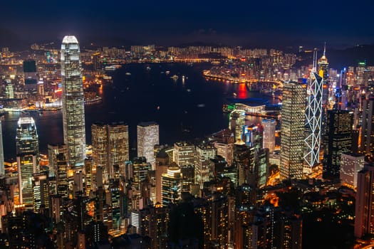 Iconic view at dusk from near the Peak overlooking Hong Kong Island and Kowloon in Hong Kong, China