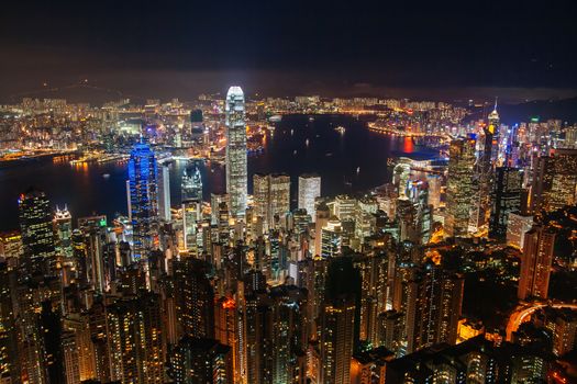 Iconic view at dusk from near the Peak overlooking Hong Kong Island and Kowloon in Hong Kong, China