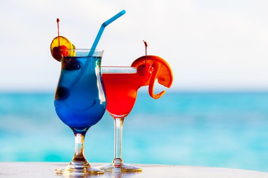 Colorful cocktails in front of the sea