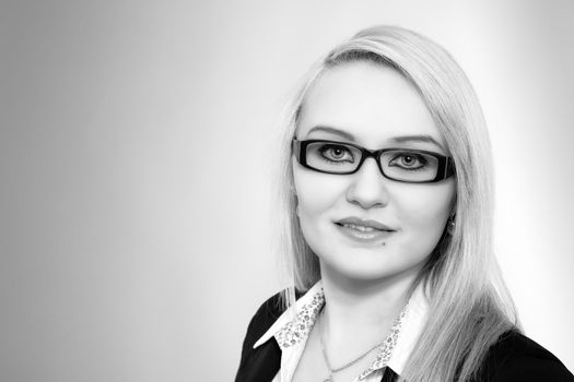 Young blonde business woman, portrait