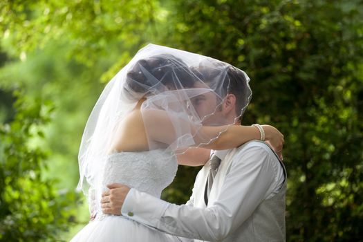 The young wedding couple at a wedding shoot