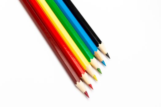 Some colorful wooden pencils on a white background