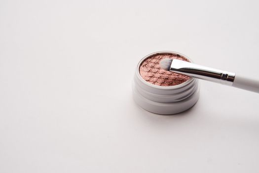 professional eyeshadow on isolated background and makeup brushes cosmetics fashion. High quality photo