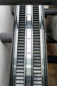 Closeup of the escalator in the big building.