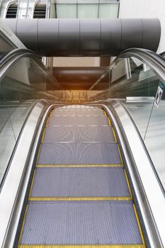 Closeup of the escalator in the big building.