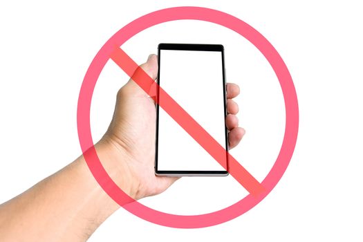 Hand holding smart phone with do not use smart phone sign isolated on white background.