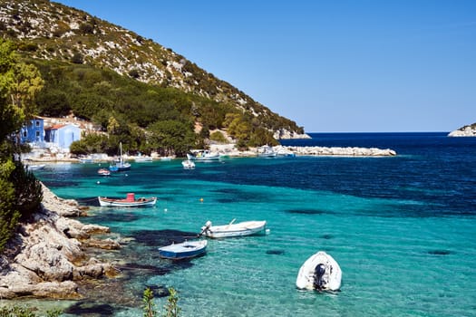 Boats in a rocky bay on the island of Kefalonia in Greece