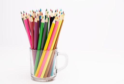 A Colorful wooden pencils stand in a pencil holder