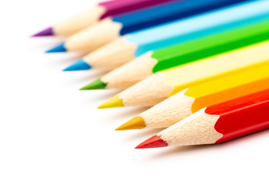 A Colorful color wooden pencils on a white background