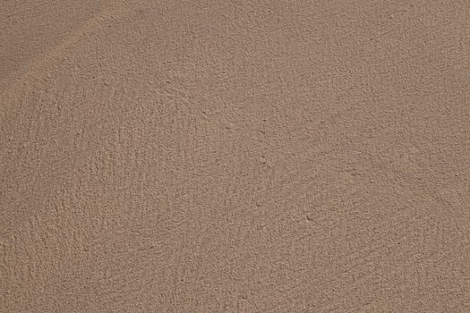 Texture of sand as background from the beach