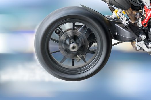 Test the rotation of the wheel and the burning of a motorcycle tire.