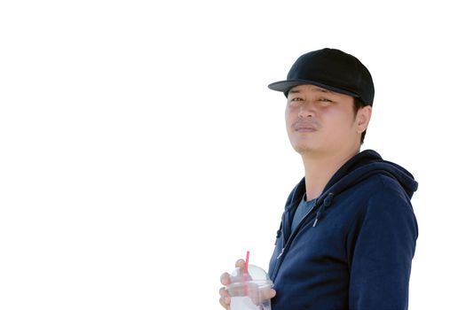 Asian man wearing a blue long sleeve shirt and wearing a hat holding a plastic glass of water isolated on white background.