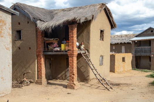 The native Malagasy house with its inhabitants