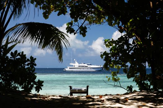 View from the island to the ocean with a boat