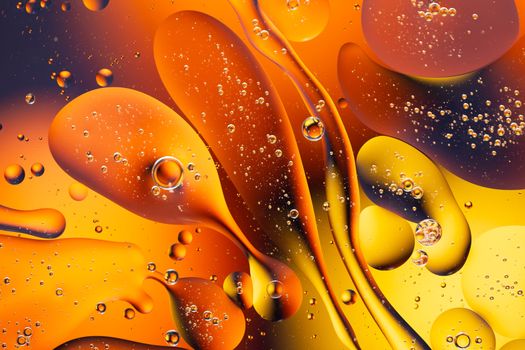 A Close-up water and oil abstract in a rainbow lighting effect