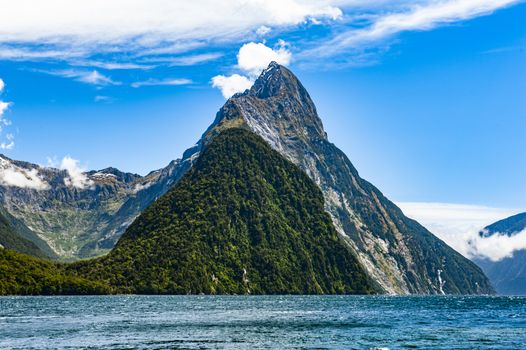 Famous Mitre Peak rising from the Milford Sound fiord. Fiordland national park, New Zealand