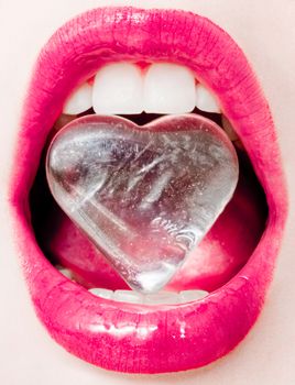 Icy heart, female lips with glossy lipstick and white teeth for glamour and beauty brand ads