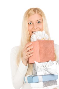 Smiling blonde girl with gift boxes in Christmas, woman and presents in winter season for shopping sale and holiday brands