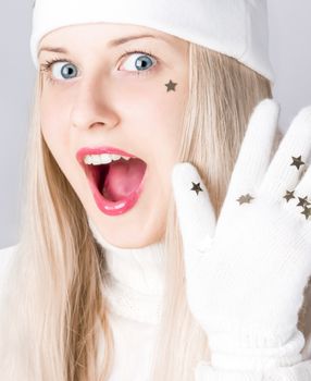 Happy blonde girl in Christmas time, woman with positive emotion in winter season for shopping sale and holiday brands