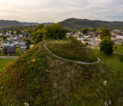 Aerial drone shot of the ancient historic native American burial mound in Moundsville, WV