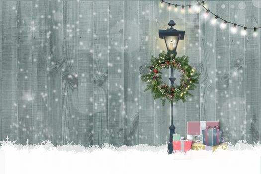 Christmas New Year wooden background Christmas gift boxes, floral wreath, string of lights, street light on wooden background with snow. Place for text, 3D Illustration.