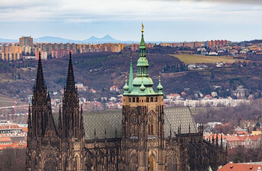 Aerial close up view of e of Metropolitan Cathedral of Saints Vitus with historic buildings from Petrin Hill on the day with Czech Republic